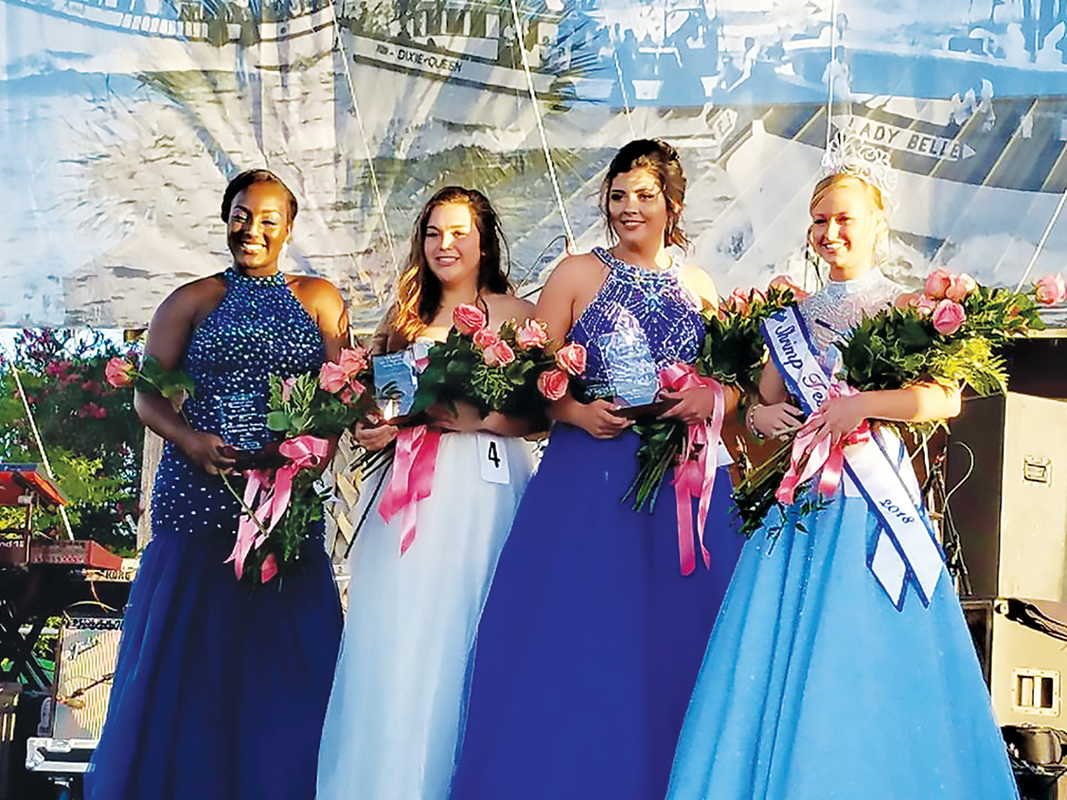 The 55th annual Isle of Eight Flags Shrimp Festival featured the Miss Shrimp Festival Scholarship Pageant, among several other events. Displayed in the photo are Miss Congeniality Arriell Drayton, second runner-up Taylor Alvare, first runner-up Olivia Liliskis and Miss Shrimp Festival Pageant winner Emily Colson.